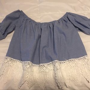 Blue short sleeve off the shoulder shirt